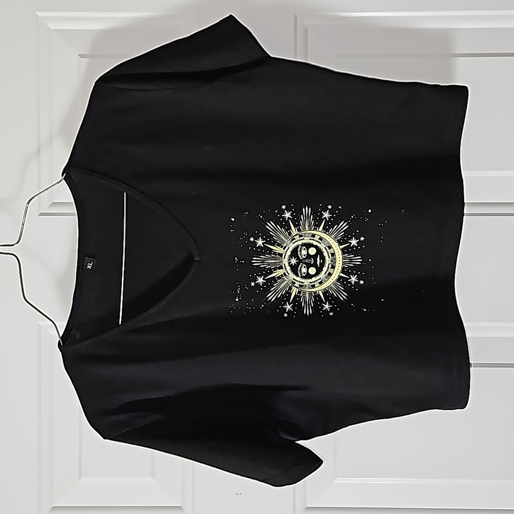 Women's face in the galaxy cropped top